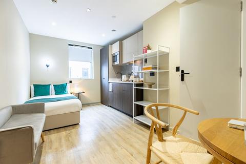 undefined, Tribu, 2 Old London Rd, KT2