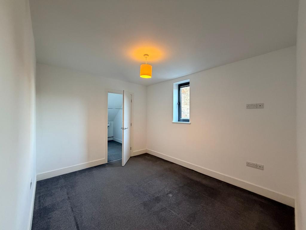 Double bedroom with walk in cupboard