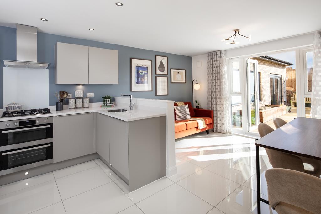 Open plan kitchen with dining area in the...