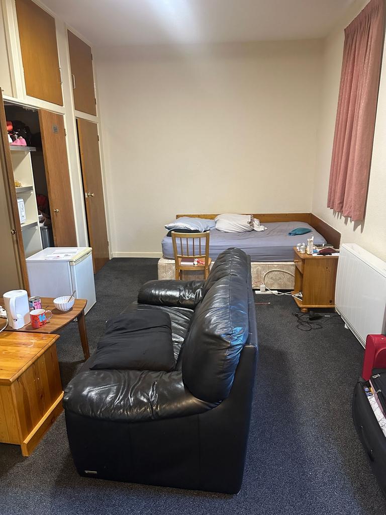 Well-laid-out room with a comfortable leather s...
