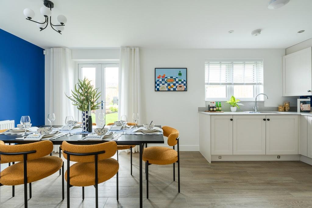 French doors to the rear garden flood the space...