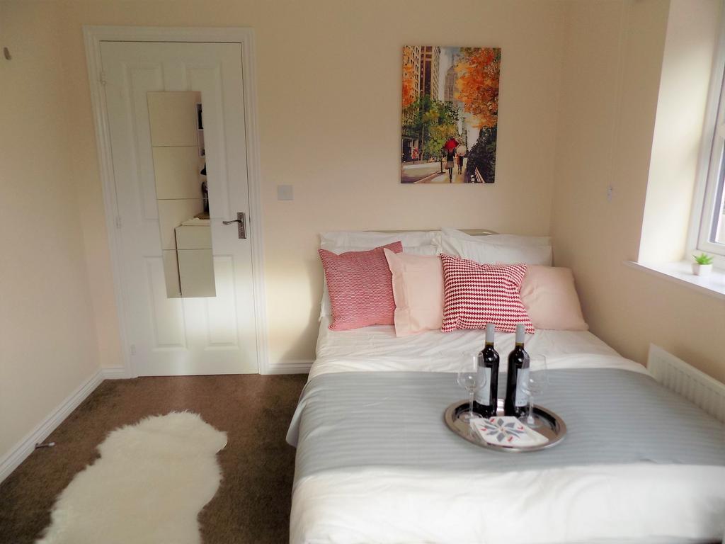 Bright, neatly presented bedroom with a double ...