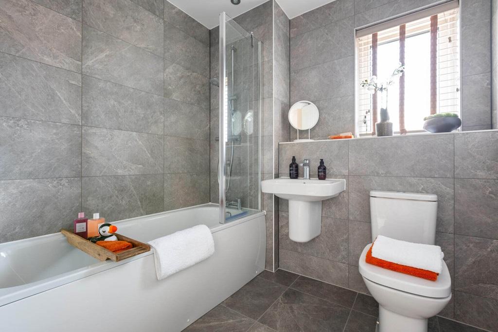 A family bathroom completes the home