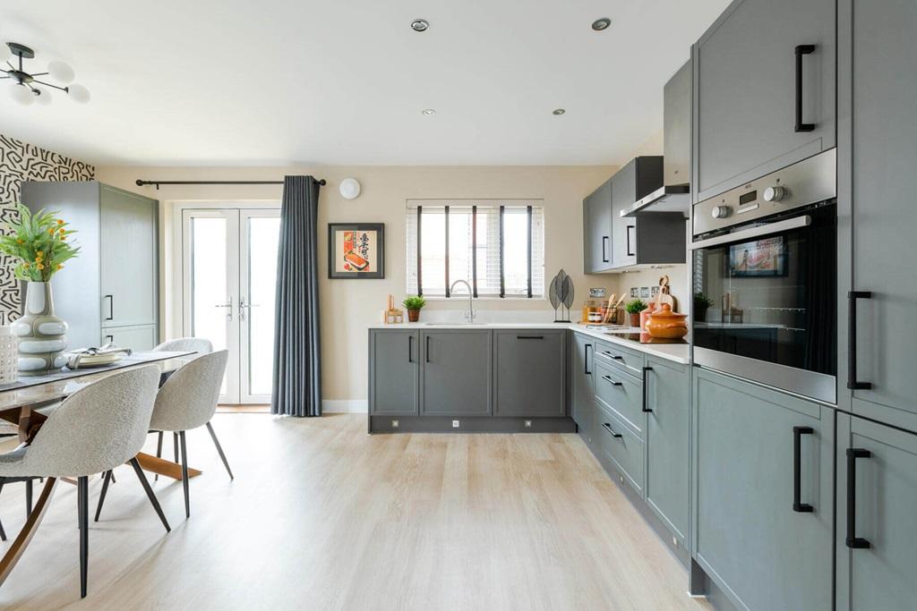 The open plan kitchen and dining area if...