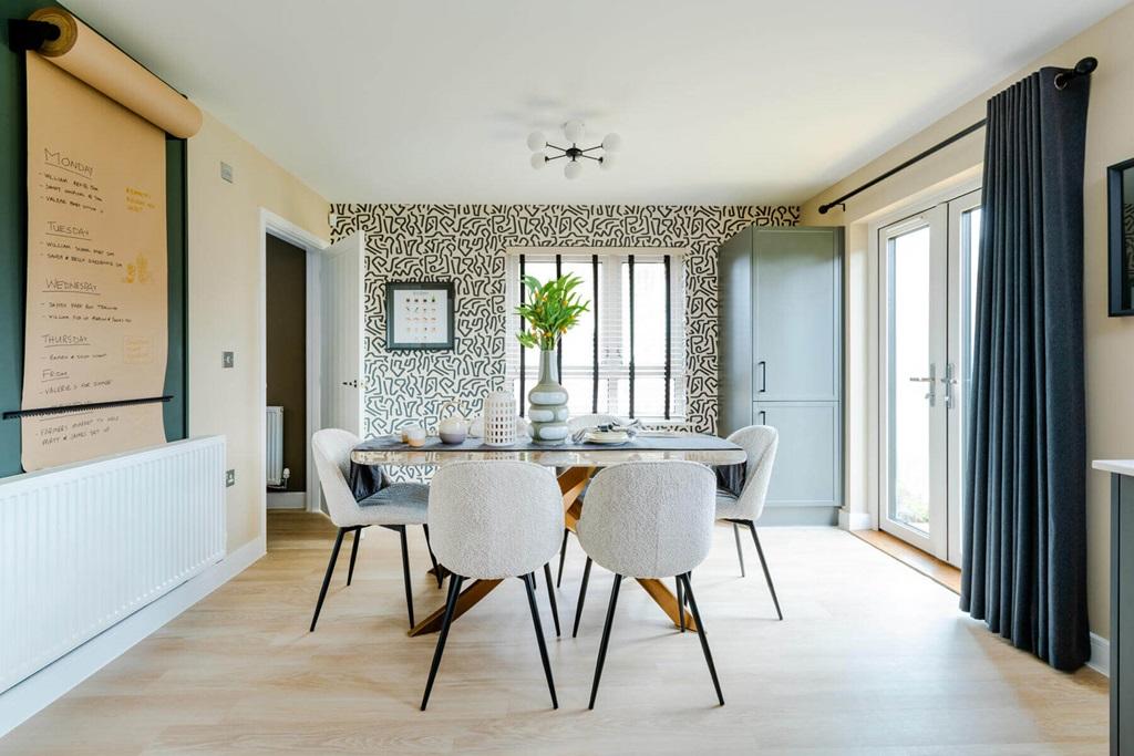 Double doors lead from the dining area to the...