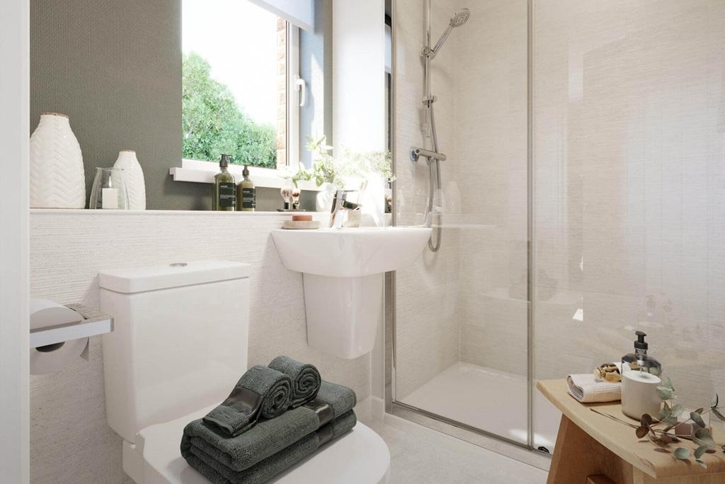 Bedroom 1 also features a private en suite...