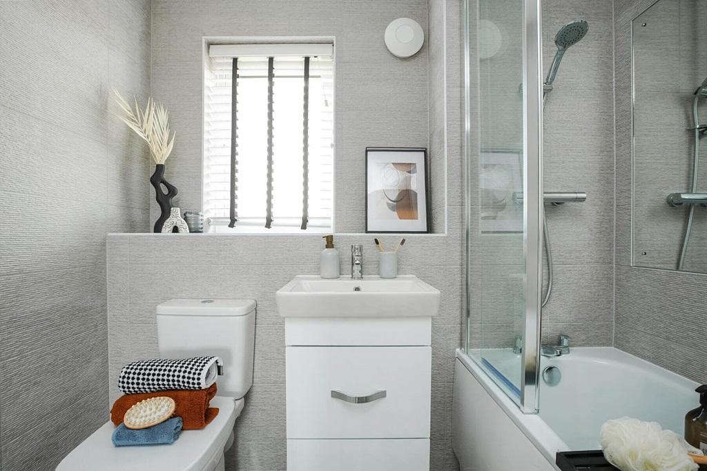 A family bathroom completes the home