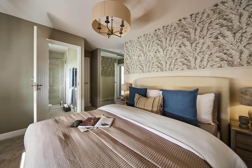 The main bedroom also features an private en...