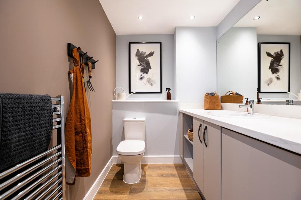 A downstairs toilet and utility room adds...