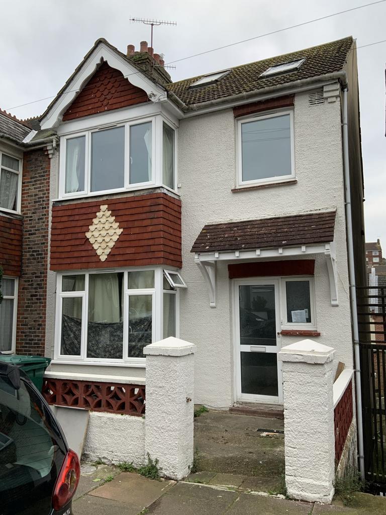 Exterior view of a traditional terraced house s...