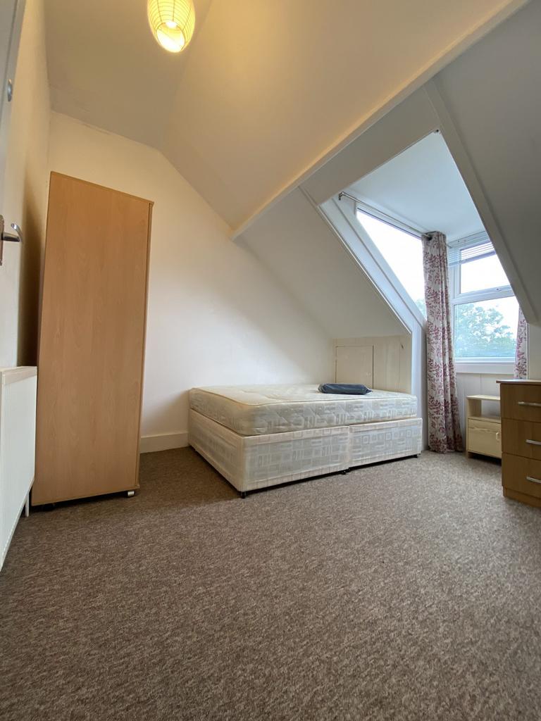 Cozy single bedroom with a comfortable mattress...