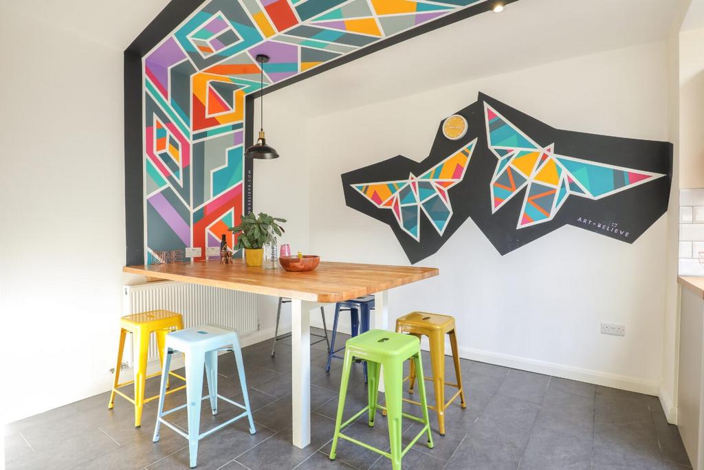 A vibrant, modern living space featuring colorf...