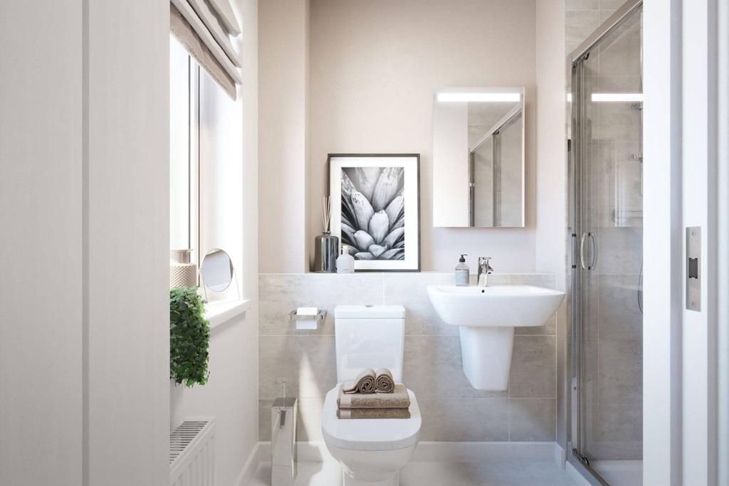 The private en suite shower room compliments...