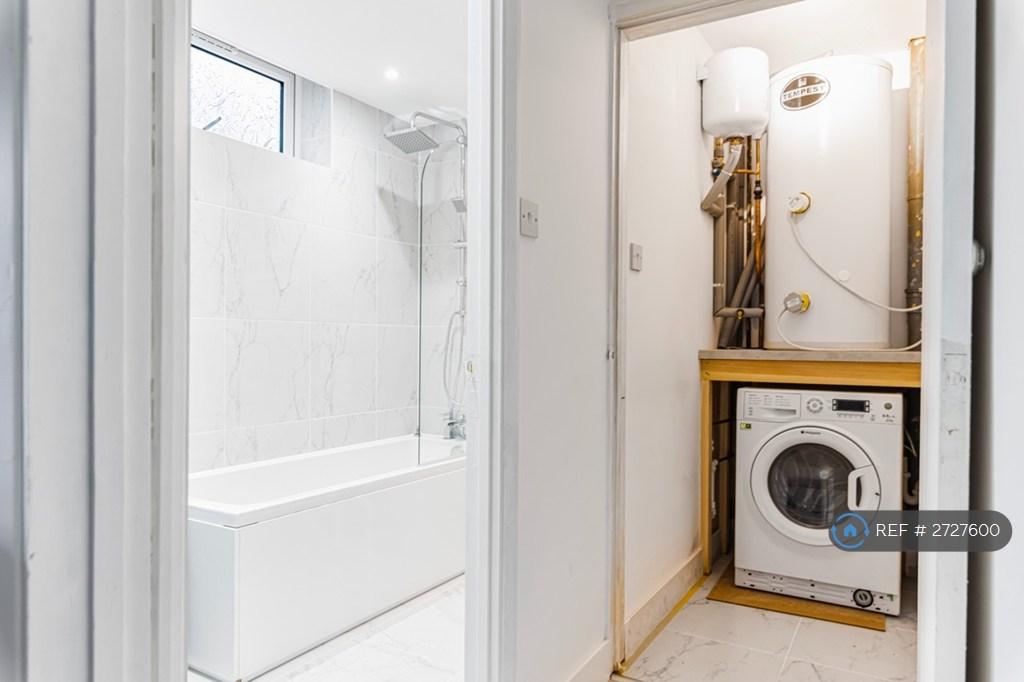 Utility Closet And Washer Dryer