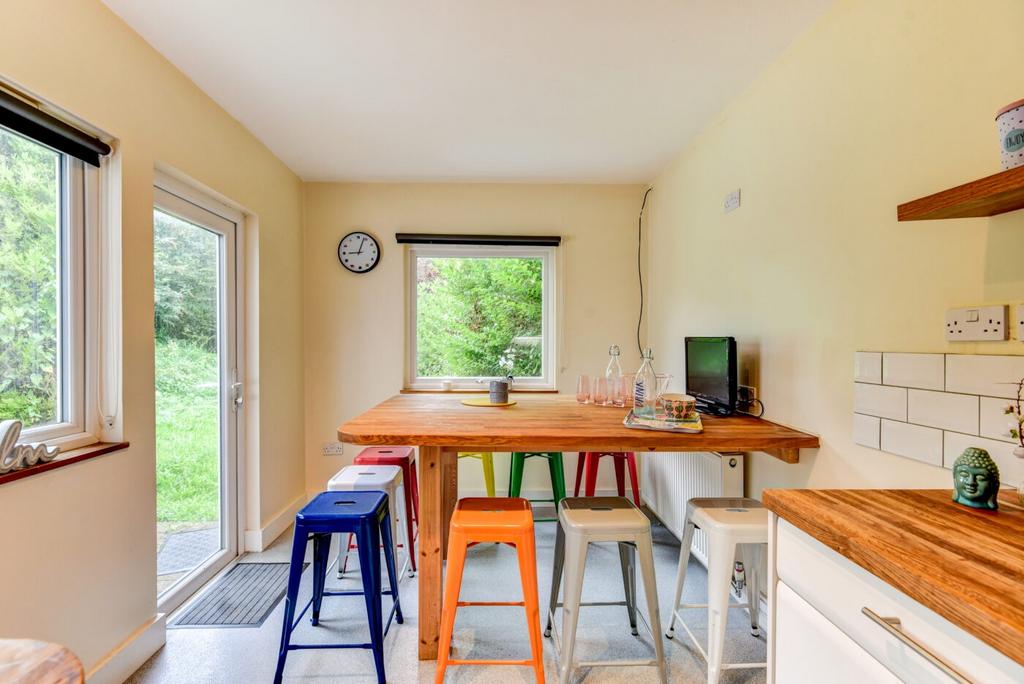 Bright and cheerful kitchen with ample natural ...