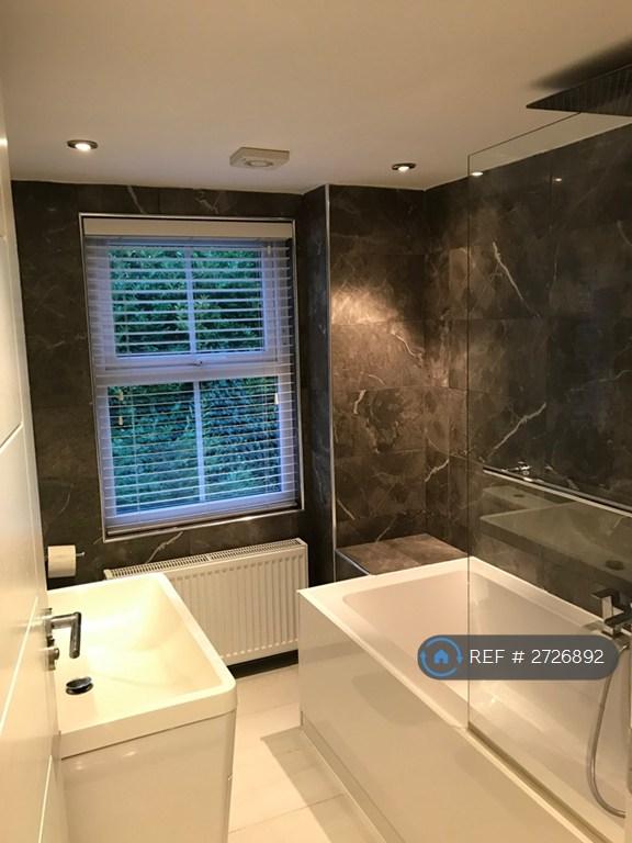 Rear En-Suite Bathroom With Bath And Rain Shower