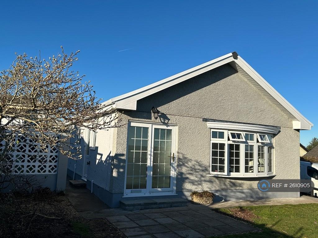 Front Of Property With Patio Seating Area