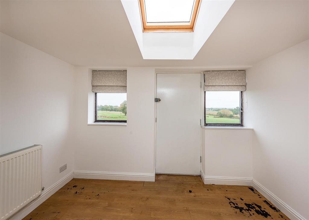 Jackanory Cottage-bed1 sitting room.jpg