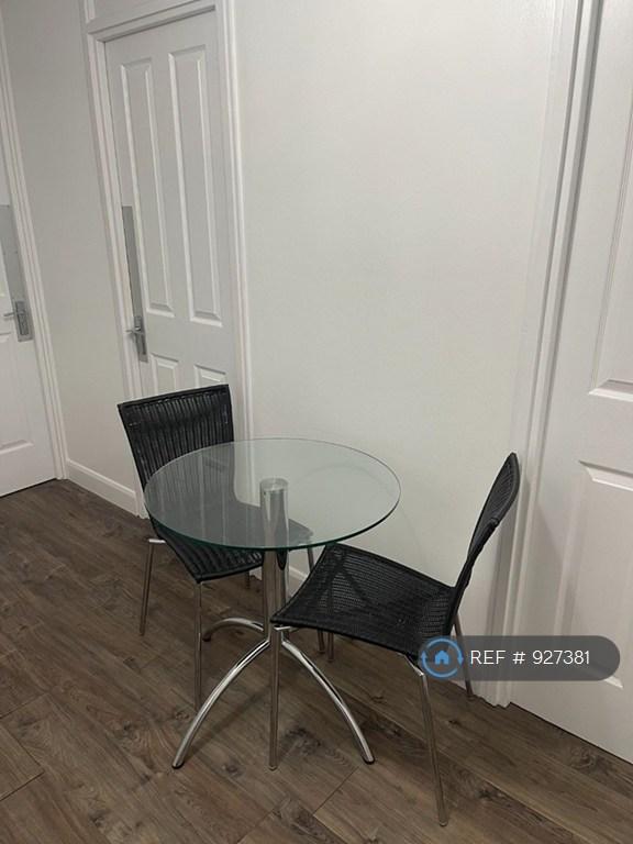 Table &amp; Chairs In Communal Area