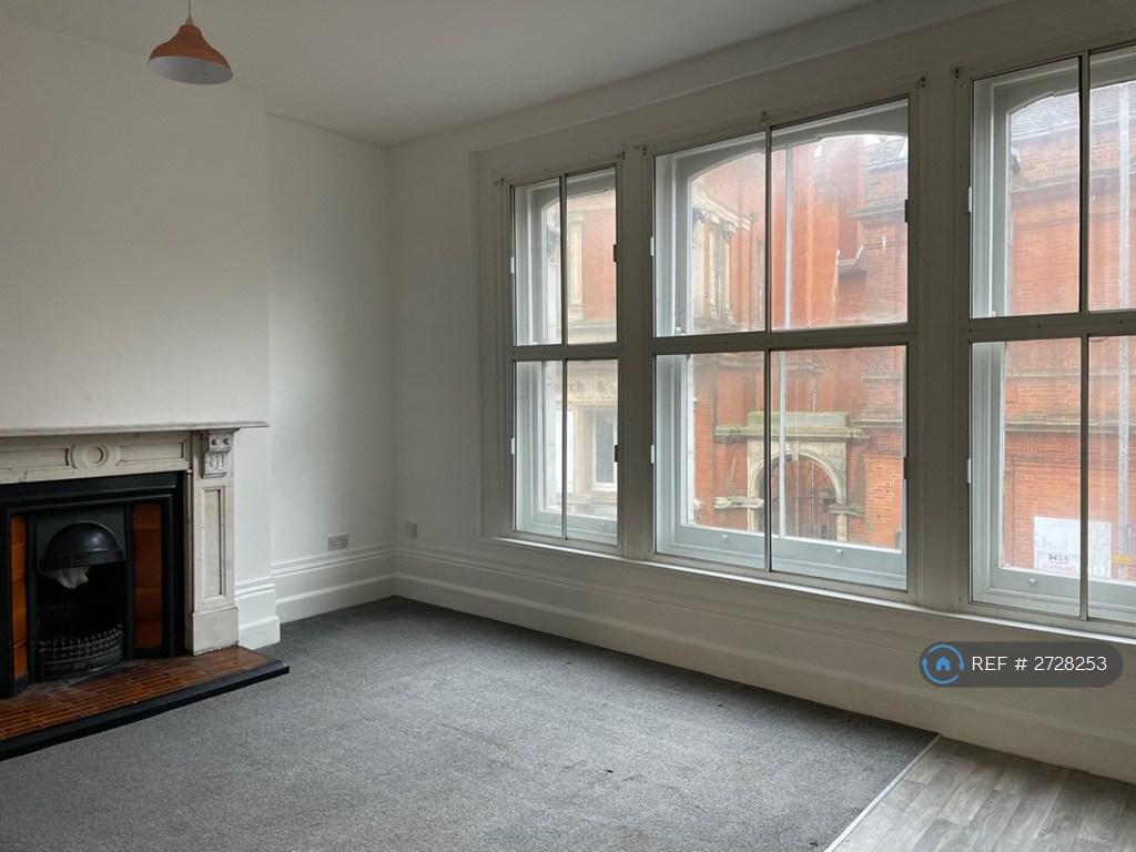 High Ceilings &amp; Large Windows
