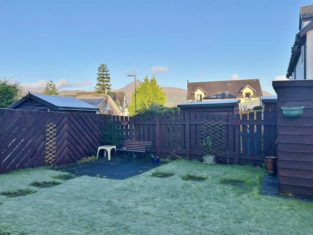 Enclosed rear garden with Goatfell in the backgrou
