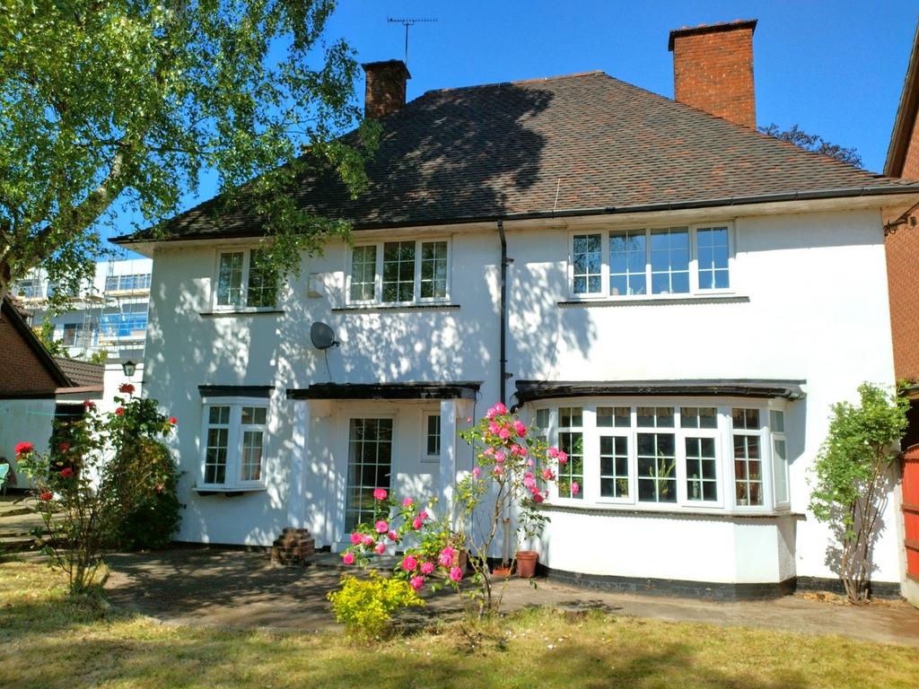 Attractive semi-detached house with a white ren...