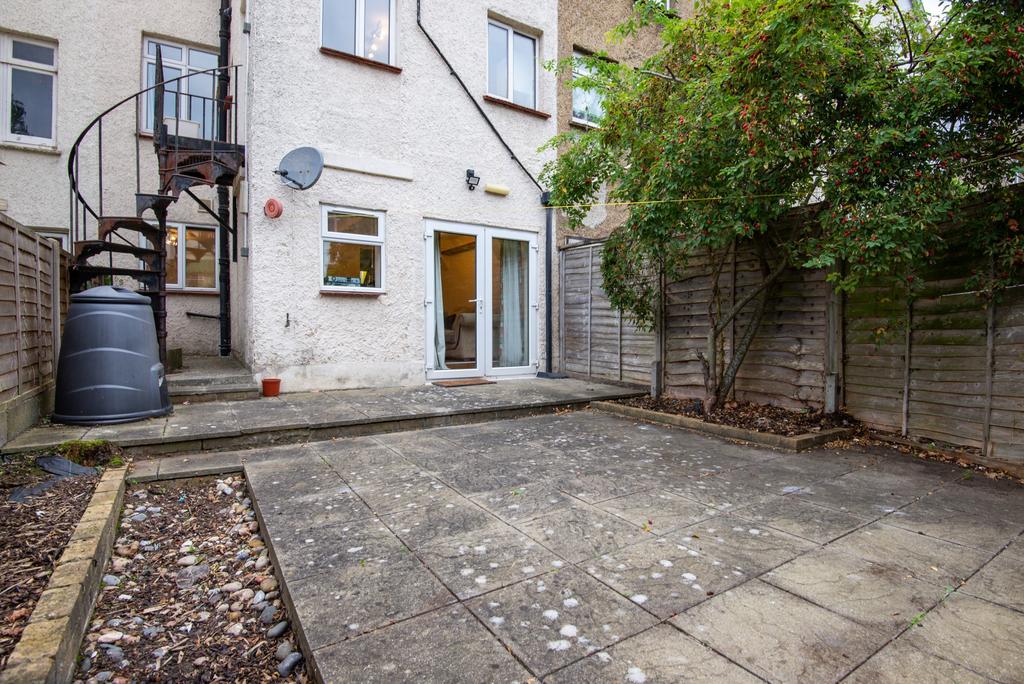 Private paved rear garden with patio area, conv...