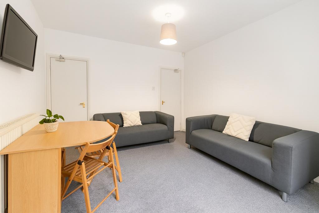 Bright and welcoming living room featuring two ...