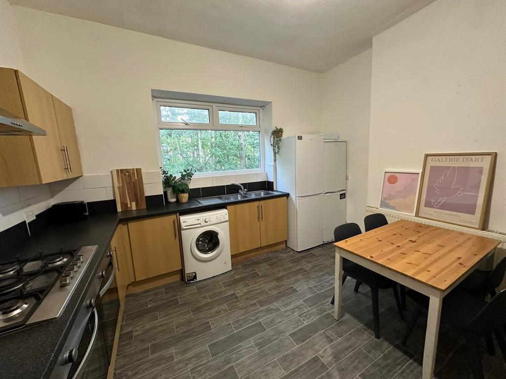 Bright and functional kitchen featuring wooden ...