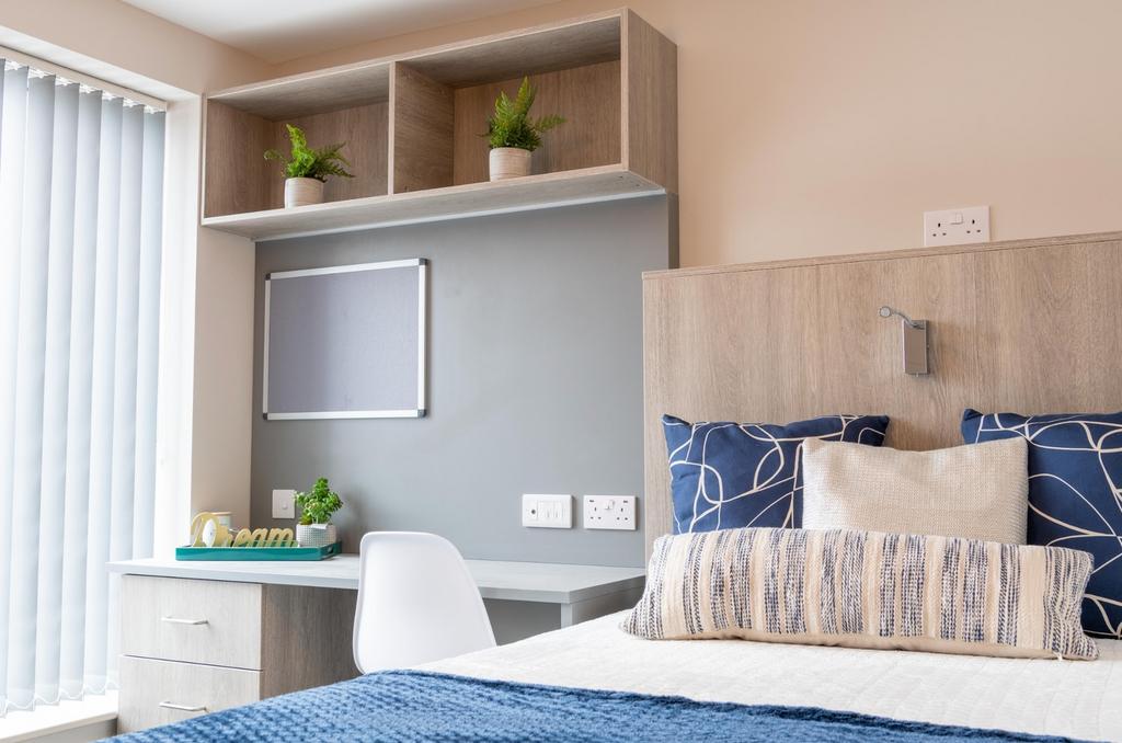 A stylish and inviting double bedroom featuring...