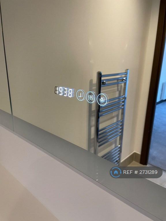Back Light, Heated Mirrors And Clock
