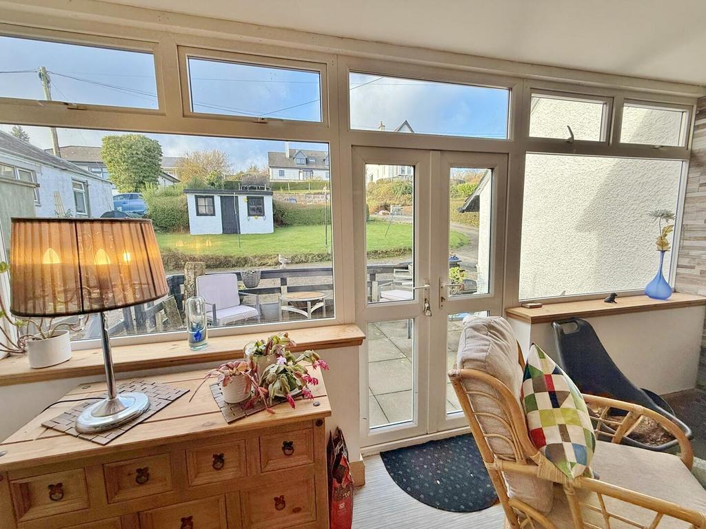 French doors to rear gardens and patio