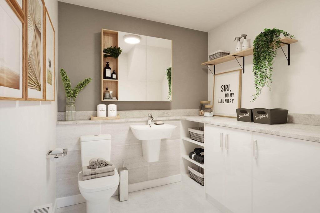 A guest cloakroom also hosts space for laundry...