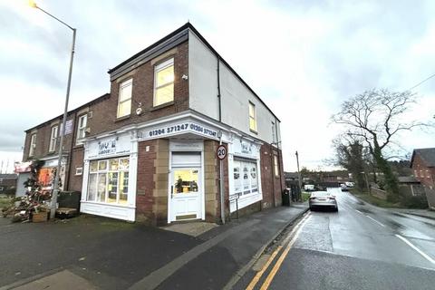 Retail property (high street) to rent, 130-132 Manchester Rd Bolton BL4 8QR