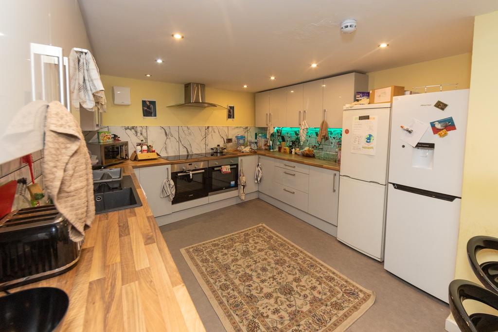 A modern and well-equipped kitchen featuring wh...