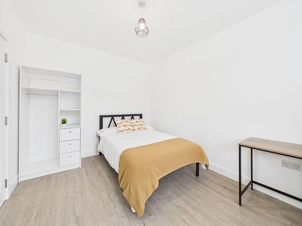 Bright and inviting master bedroom featuring a ...