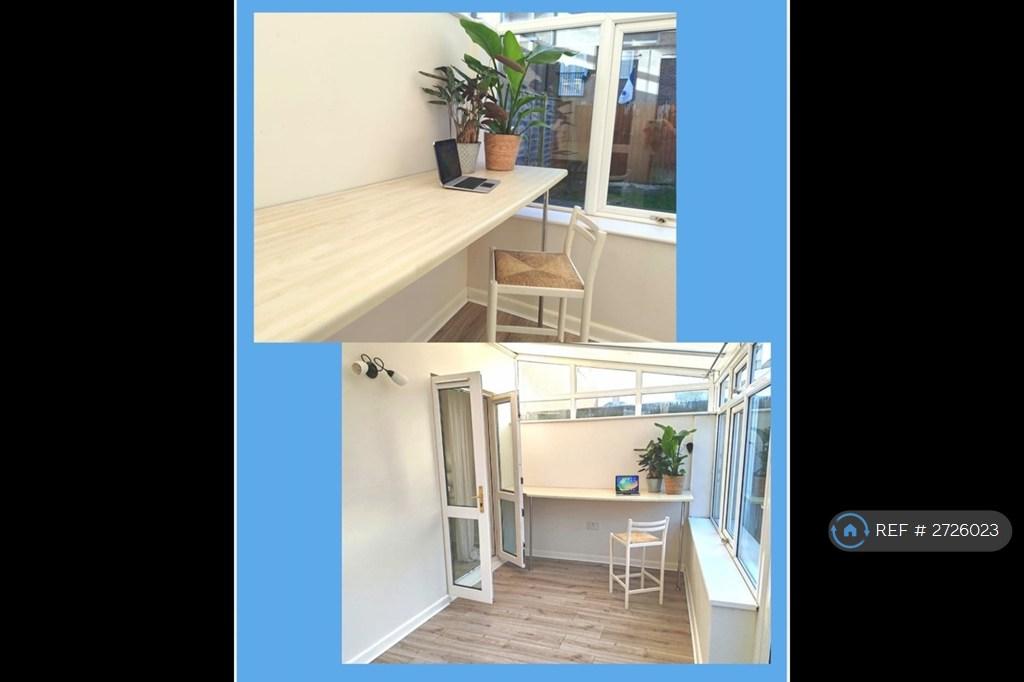 Conservatory With Work Area And Room For Dinning