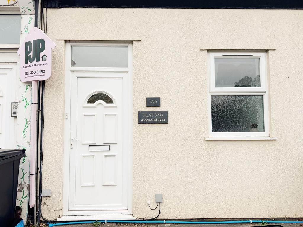 Well-maintained property frontage with a clean ...