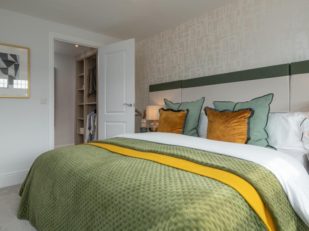 Main bedroom of the Leamington Lifestyle, a 3...