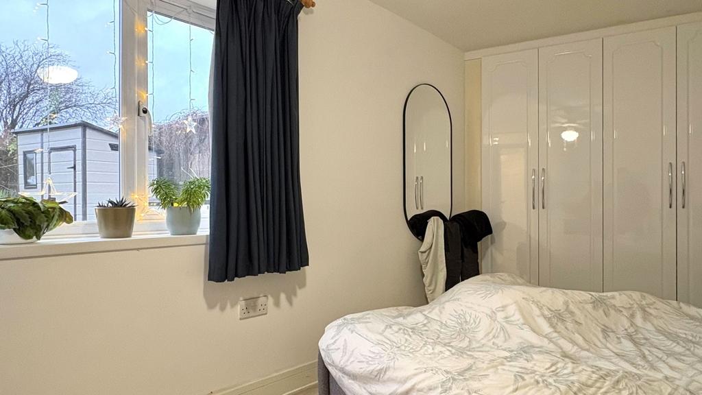 Bright double bedroom with built-in wardrobes, ...