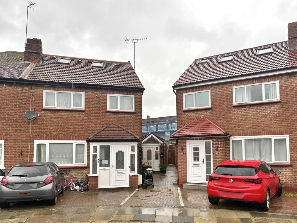Pair of well-maintained semi-detached houses wi...