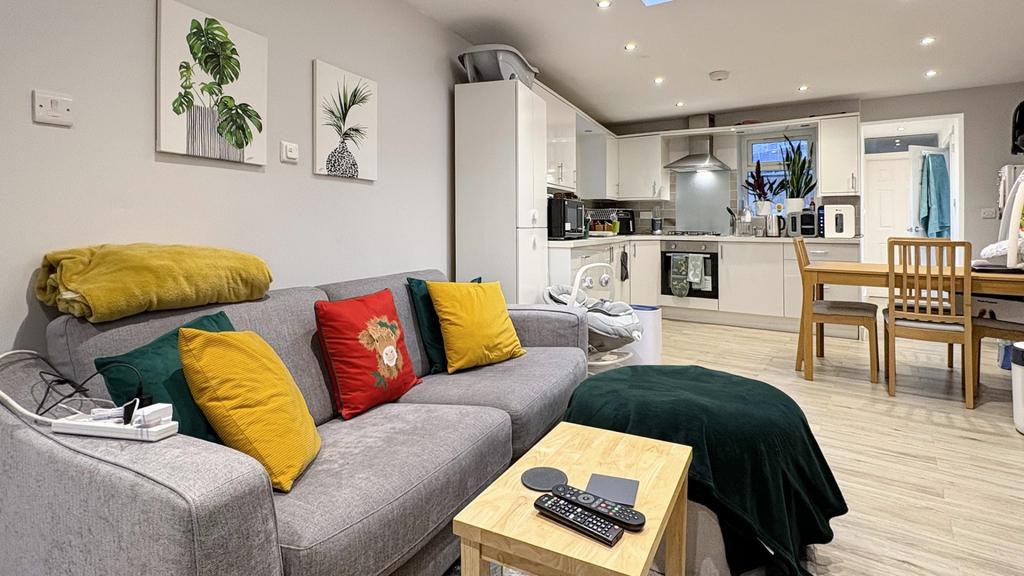 Modern open-plan living area with a comfortable...