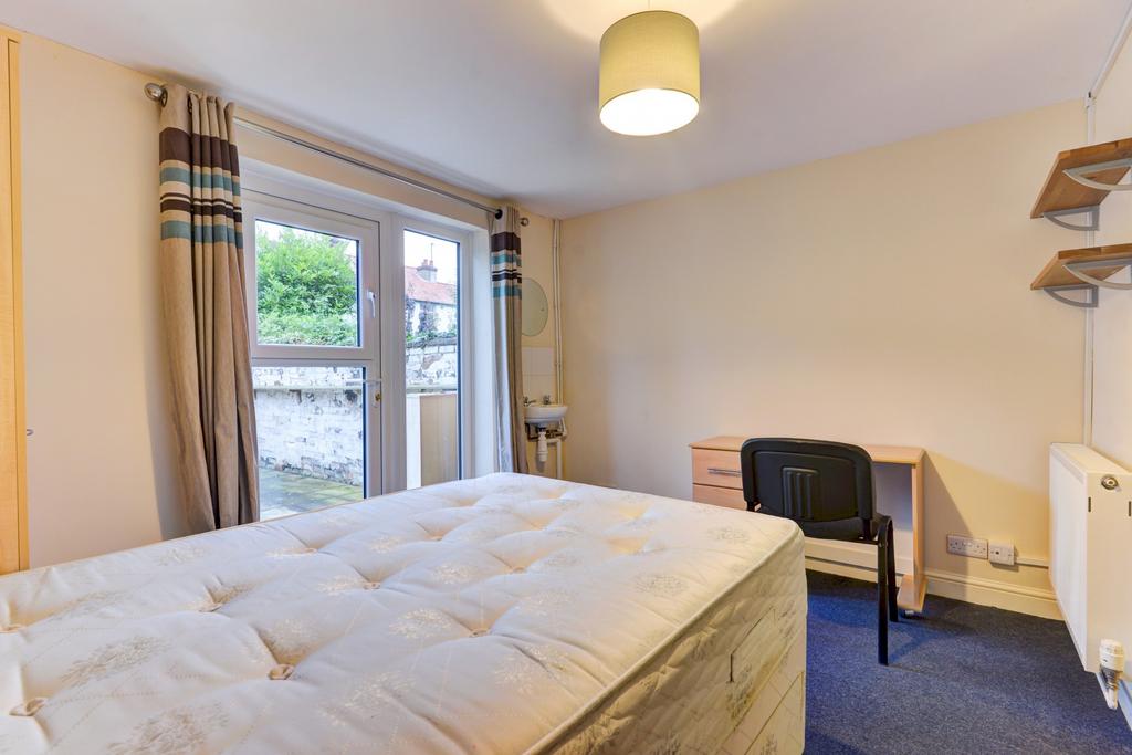 Bright, neatly presented double bedroom with a ...