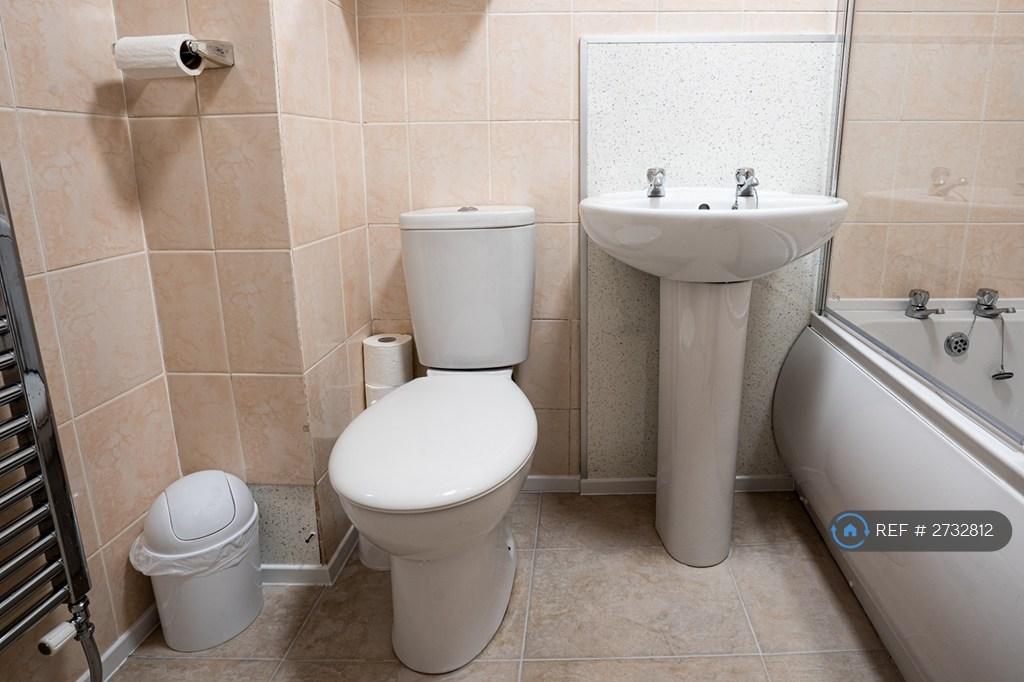 Bathroom With Bath And Electric Shower