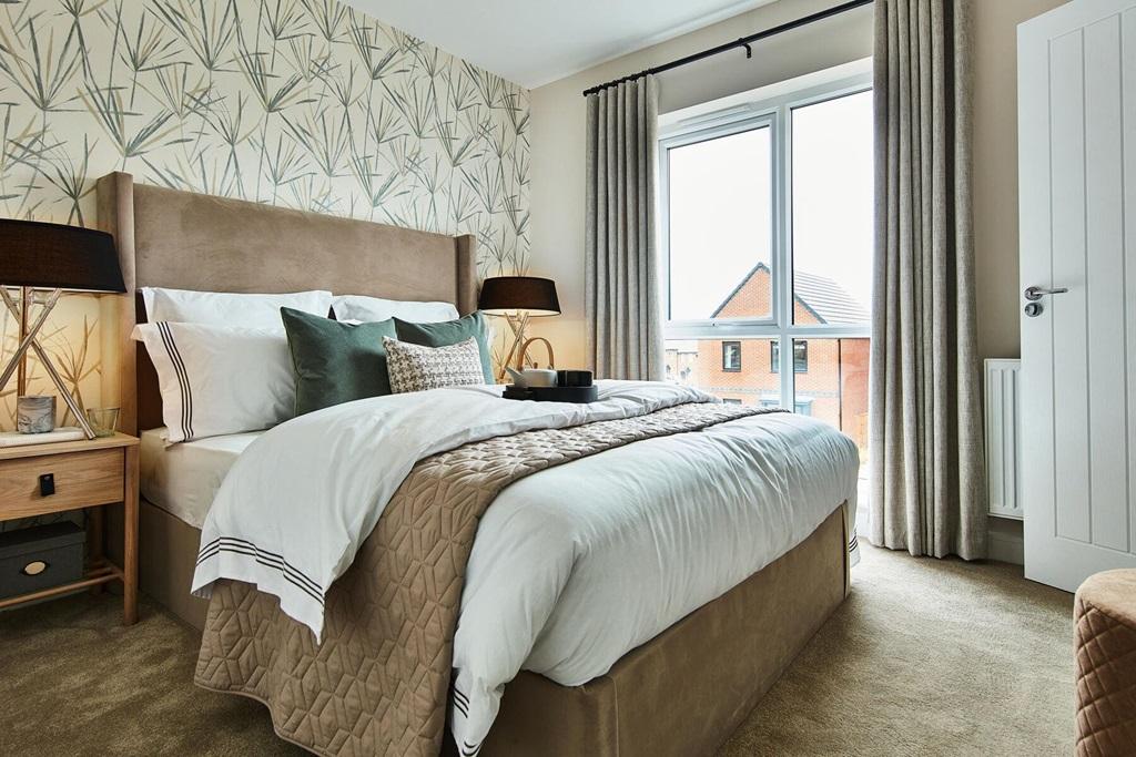 The king-size main bedroom has ample storage space