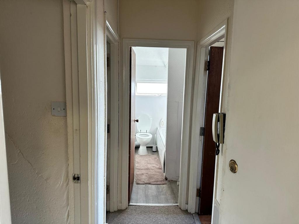 A tidy bathroom featuring essential amenities, ...