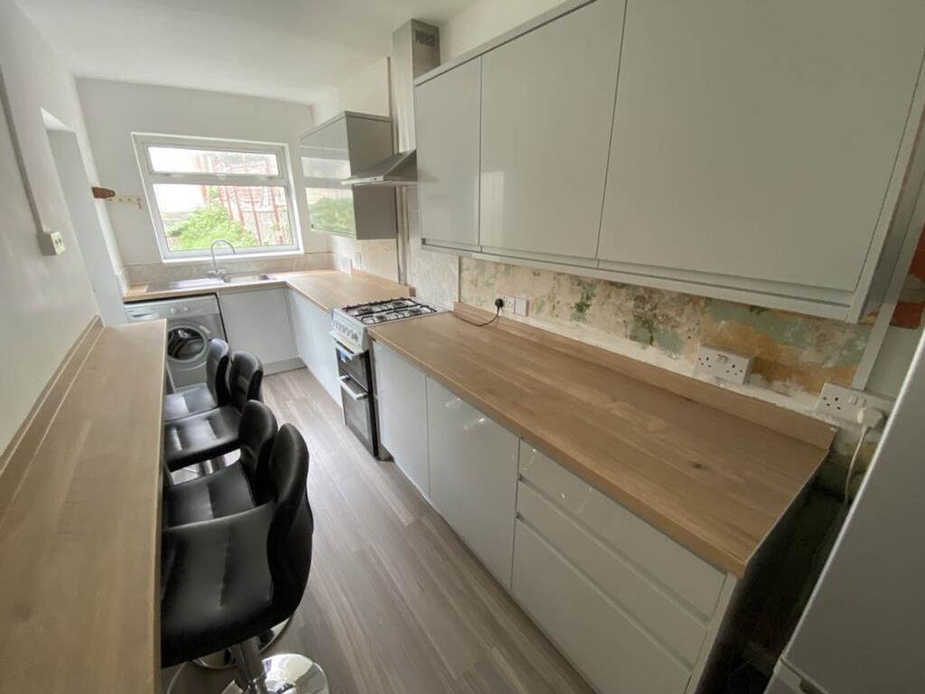 A modern kitchen with ample counter space and n...