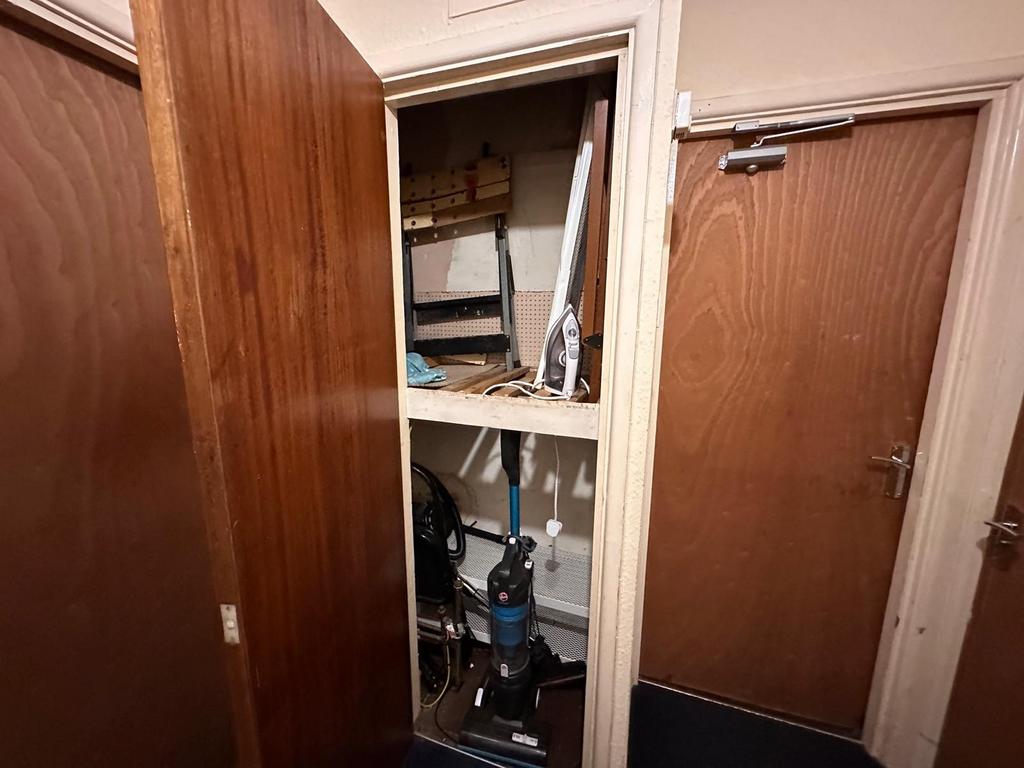 Compact hallway storage cupboard with built-in ...