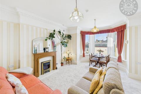undefined, 'Start your day above the city, coffee in hand, from this top floor balcony apartment'