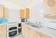 Additional image 13 of 'Start your day above the city, coffee in hand, from this top floor balcony apartment'